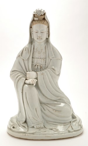 Lot 1251 - Chinese Dehua figure of Guan Yin, with...