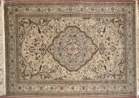 Lot 1308 - A Turkish Kaysari rug, floral designs on buff...