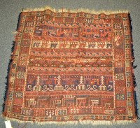 Lot 1316 - Fragmentary flat woven saddle-bag/rug,...