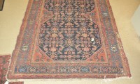 Lot 1318 - Hamadan rug, indigo field of double lozenge...