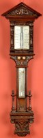 Lot 1334 - A Victorian carved oak stick barometer, by...