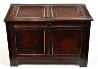 Lot 1355 - A late 17th Century oak coffer, with panelled...