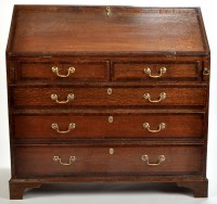 Lot 1376 - A George III oak and mahogany crossbanded...