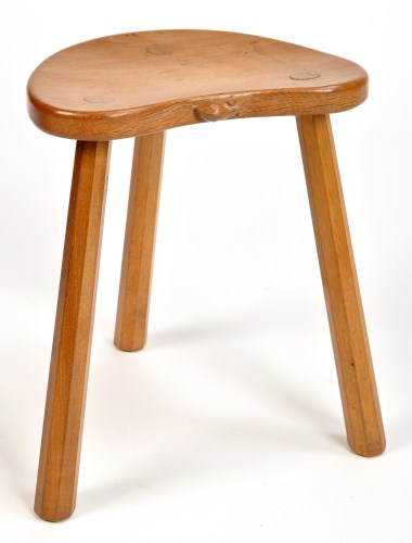 Lot 1396 - An oak kidney-shaped stool, by Robert Thompson...