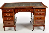 Lot 1397 - A mahogany and brass bound pedestal desk, with...