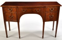 Lot 1404 - A late Georgian mahogany serpentine front...