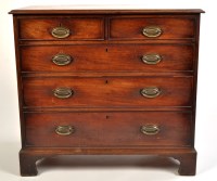 Lot 1419 - A Georgian mahogany chest of two short and...