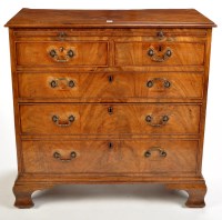 Lot 1420 - A late Georgian mahogany chest of two short...