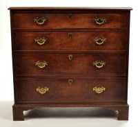 Lot 1434 - A George III mahogany chest of four long...