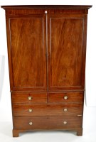 Lot 1441 - A George III gentleman's mahogany wardrobe,...