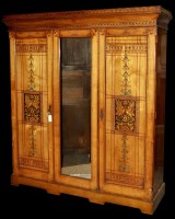 Lot 1452 - A Victorian Aesthetic movement ash wardrobe,...