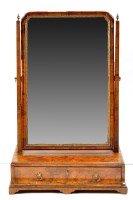 Lot 1456 - A walnut parcel gilt swing frame toilet mirror,...