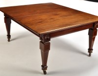 Lot 1494 - An Edwardian rectangular mahogany dining table,...