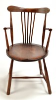 Lot 1507 - An early 20th Century elm Windsor armchair,...