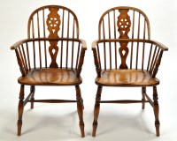 Lot 1508 - A pair of 19th Century Windsor armchairs, the...