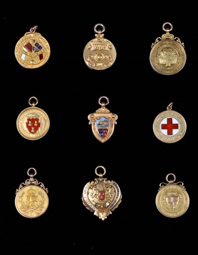 Lot 377 - A collection of football medals awarded to...
