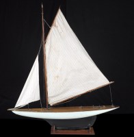 Lot 378 - An early 20th Century pond yacht, white...