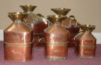 Lot 417 - Five graduating copper and brass Checkpump...