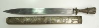 Lot 424 - A 19th Century Tibetan short sword, the 15in....