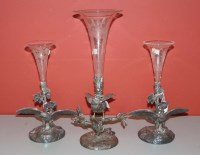 Lot 509 - A suite of three EPNS and glass epergnes, each...