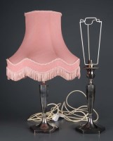 Lot 511 - A pair of EPNS table lamps, of tapering...