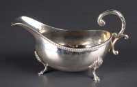 Lot 515 - An Elizabeth II sauce boat, by S.J. Rose & Son,...