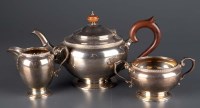 Lot 518 - A George V three-piece tea service, by Reid &...