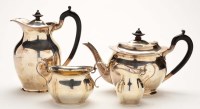 Lot 536 - An early 20th Century matched four-piece tea...