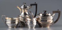 Lot 556 - A George V four-piece tea service, by S....