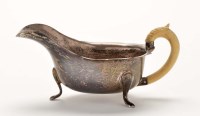 Lot 559 - A George VI sauce boat, by Viners, Sheffield...