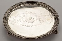 Lot 579 - A George III silver waiter, probably that of...