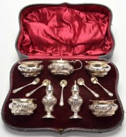 Lot 580 - An Edwardian condiment set, by Walker & Hall,...