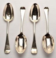 Lot 606 - Four George II table spoons, the maker's mark...