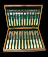 Lot 611 - A Victorian set of twelve fish knives and...