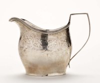 Lot 613 - A George III cream jug, by W*, London 1815, of...