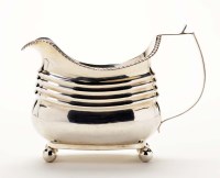 Lot 634 - A George III cream jug, by I.M, London 1811,...