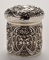 Lot 654 - An Edwardian silver embossed box and cover,...