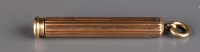 Lot 658 - A gilt fluted propelling pencil.