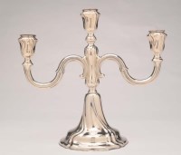 Lot 696 - A German 800 standard three-light candelabra,...