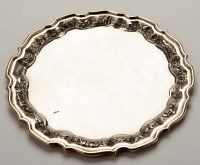 Lot 709 - A sterling silver letter tray, shaped circular...