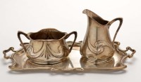 Lot 711 - A German 800 standard cream jug, sugar bowl...