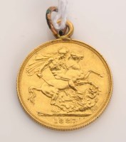 Lot 719 - A Victorian gold sovereign, dated 1887, with...