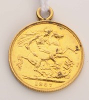 Lot 720 - A Victorian gold sovereign, dated 1887, with...