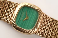 Lot 735 - Beuche Girod: a lady's 9ct. gold wristwatch,...