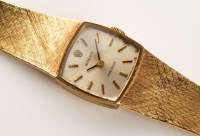 Lot 741 - Rolex: a lady's 9ct. gold wristwatch with...