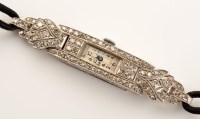 Lot 751 - A diamond cocktail watch, c.1910, the oblong...