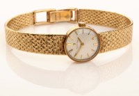 Lot 754 - Omega: a 9ct. gold lady's wristwatch, with...