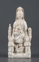 Lot 998 - A Dehua figure of Guanyin, probably 19th...