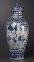 Lot 1017 - A large blue and white baluster vase and cover,...