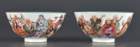 Lot 1021 - A near pair of Famille Rose bowls, decorated...